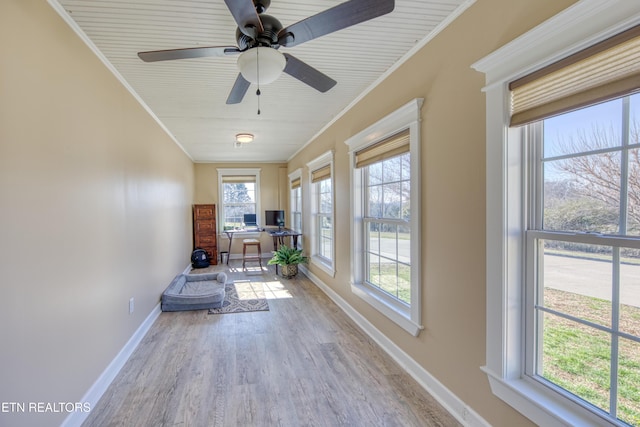 interior space with a ceiling fan