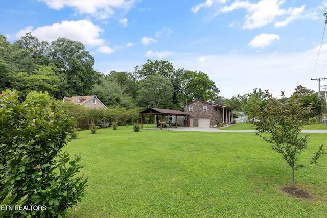 1301 Chert Pit Rd, Knoxville, TN 37923 - view of green lawn featuring a carport, a gazebo, and a garage