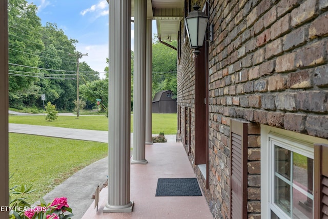 1301 Chert Pit Rd, Knoxville, TN 37923 - covered porch featuring a yard