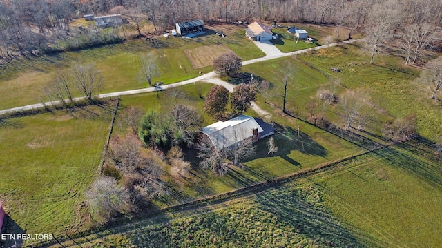 birds eye view of property featuring a rural view