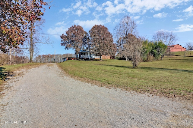 view of road featuring driveway