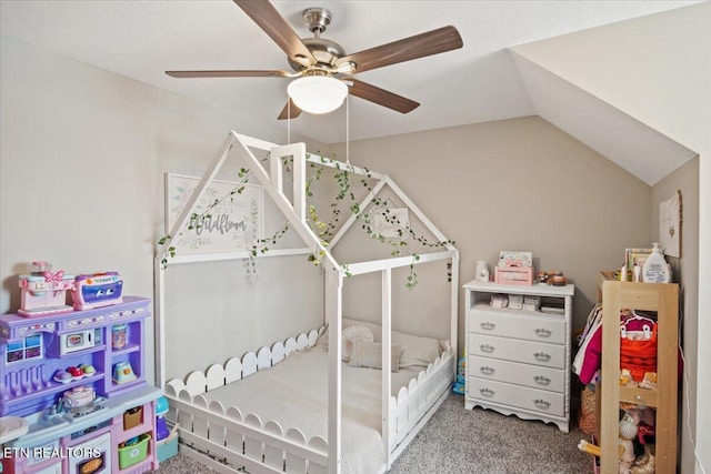 bedroom with lofted ceiling, carpet floors, and ceiling fan