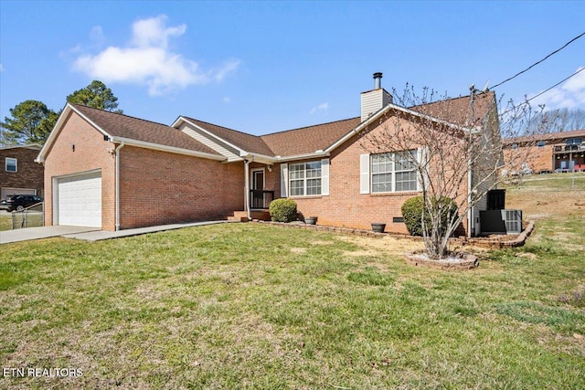 ranch-style home featuring central air condition unit, a front lawn, an attached garage, crawl space, and a chimney