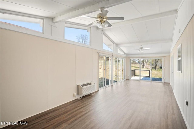 unfurnished sunroom with a wall mounted air conditioner, lofted ceiling with beams, and a ceiling fan