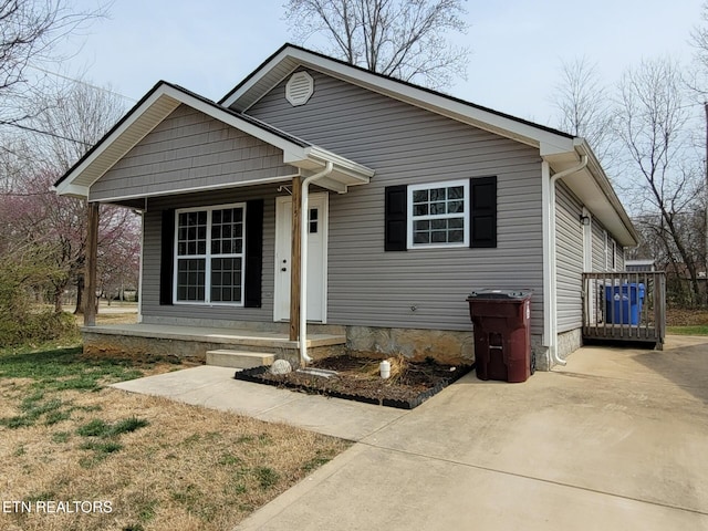 bungalow-style home featuring covered porch