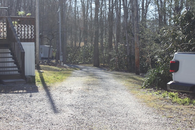 299 Harmony Way, Cosby, TN 37722 - view of dirt / gravel road with stairs and a forest view