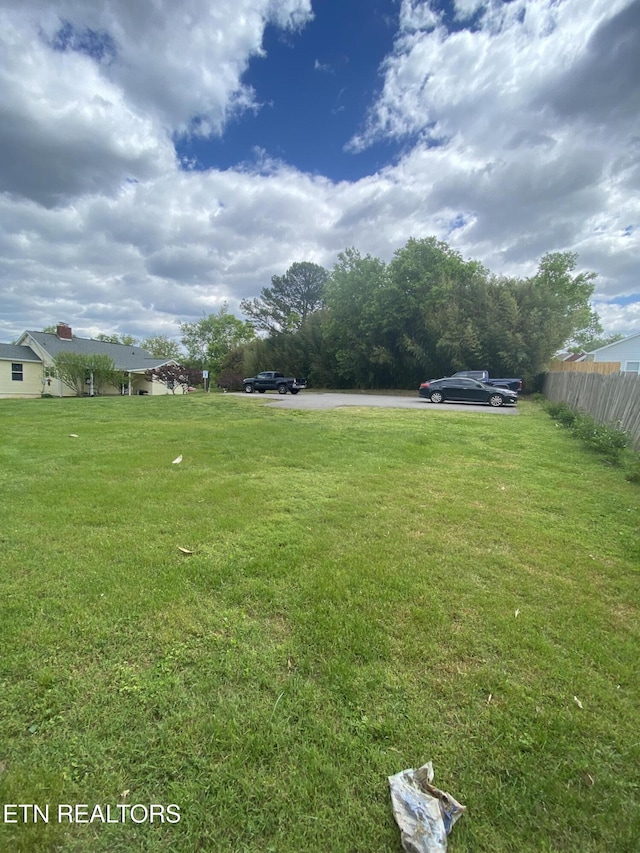 view of yard with fence