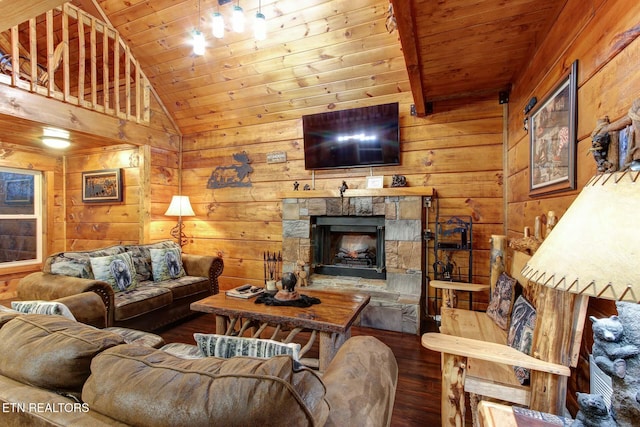 living area with vaulted ceiling, wooden ceiling, a fireplace, and wood finished floors