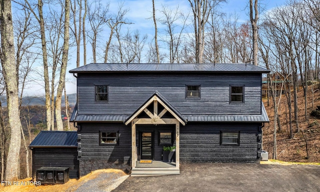 view of front of house featuring central AC