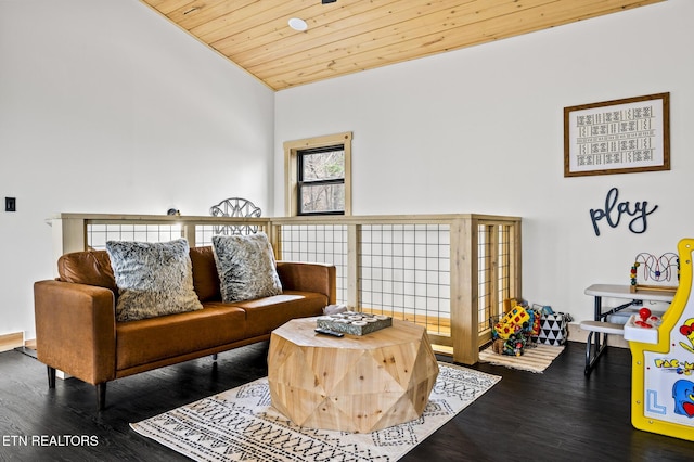 living room featuring dark wood finished floors, wooden ceiling, and vaulted ceiling