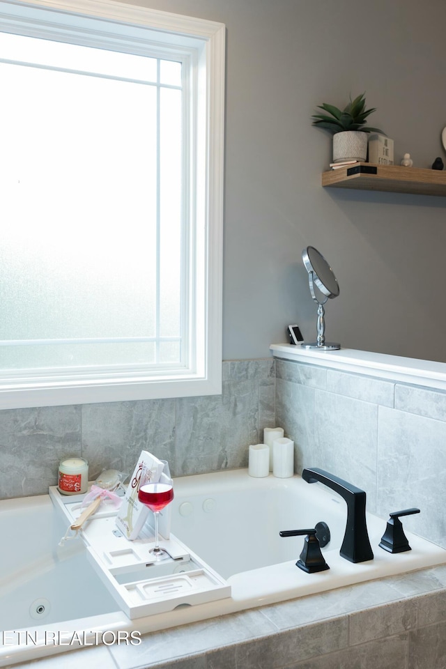 bathroom featuring a bath