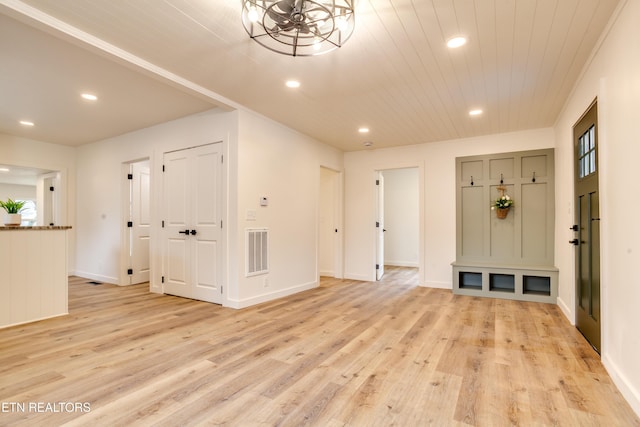 entrance foyer with visible vents, recessed lighting, light wood-type flooring, and baseboards