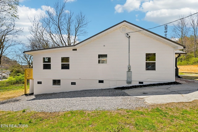 view of property exterior featuring crawl space