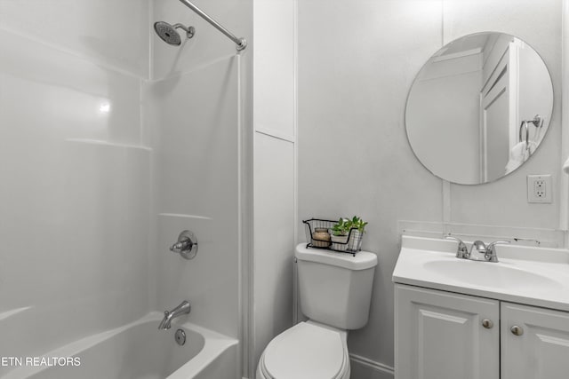 full bathroom with shower / bathing tub combination, toilet, and vanity