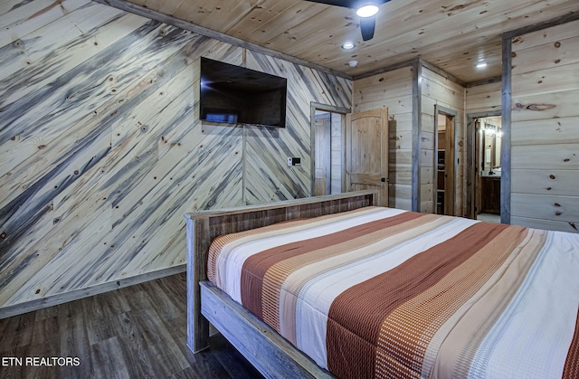 bedroom with wooden walls, baseboards, recessed lighting, wooden ceiling, and wood finished floors