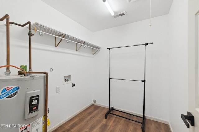 clothes washing area with hookup for a washing machine, visible vents, hookup for an electric dryer, laundry area, and water heater