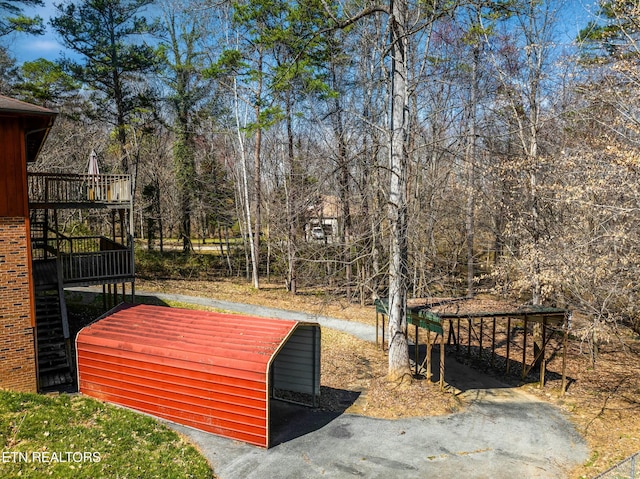 view of yard with a wooden deck