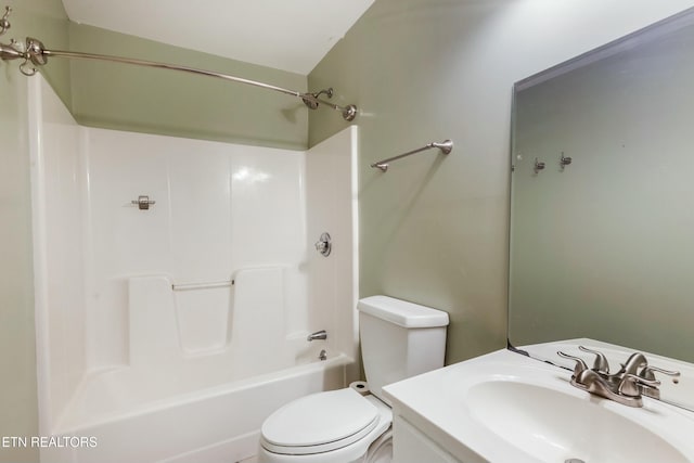 full bath featuring bathing tub / shower combination, toilet, and vanity