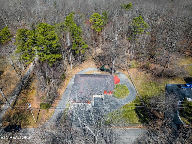 drone / aerial view with a view of trees