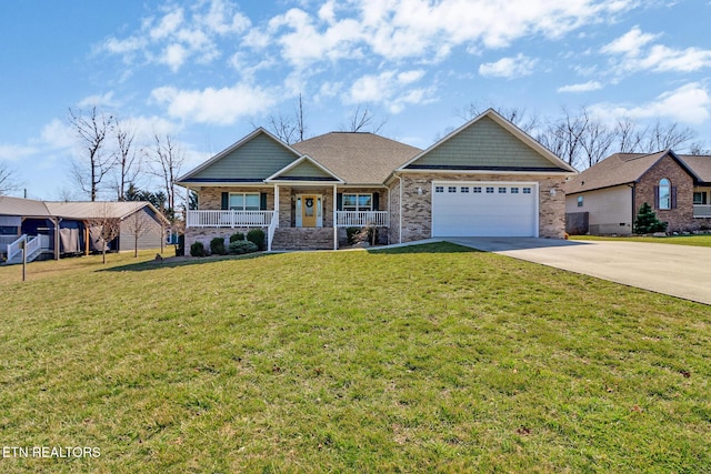 craftsman inspired home featuring covered porch, an attached garage, concrete driveway, and a front yard