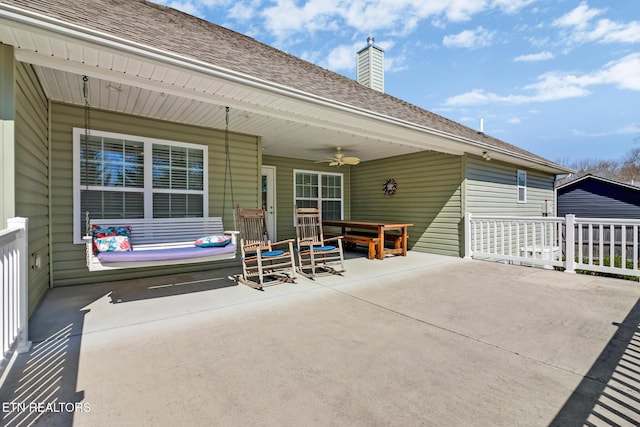 view of patio with ceiling fan