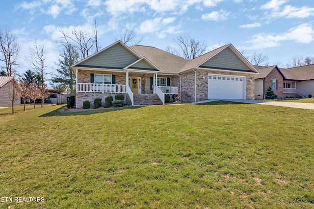 craftsman house with covered porch, concrete driveway, a front yard, a garage, and brick siding