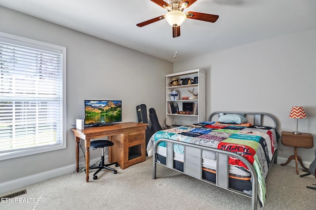 bedroom with visible vents, ceiling fan, carpet, and baseboards