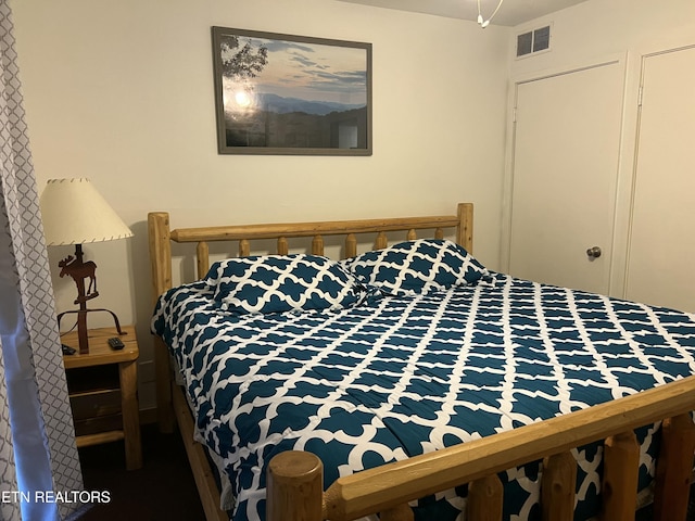 bedroom with visible vents