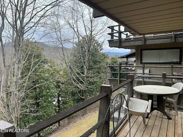 balcony featuring outdoor dining area