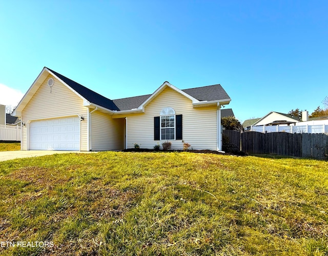 single story home with an attached garage, concrete driveway, a front yard, and fence