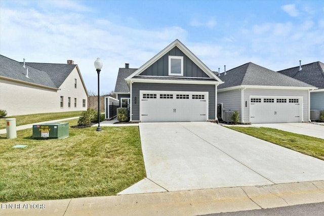 view of front facade with a front lawn, concrete driveway, central AC unit, and board and batten siding