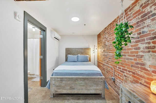 bedroom featuring carpet flooring, brick wall, and a wall mounted AC