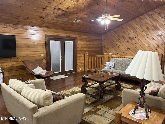 living area with a ceiling fan, wood finished floors, visible vents, lofted ceiling, and wood ceiling