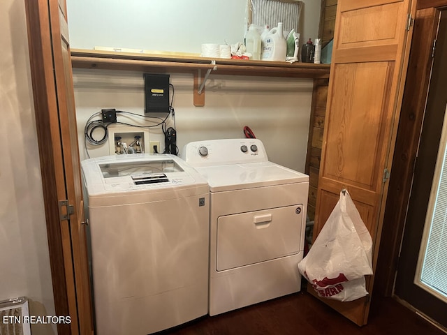 clothes washing area with washing machine and dryer and laundry area