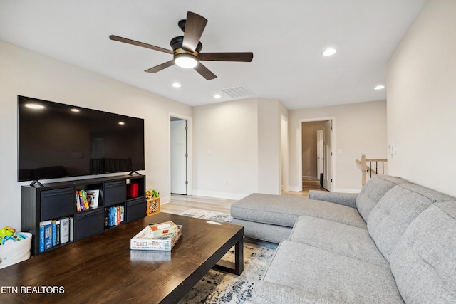 living area featuring recessed lighting, visible vents, wood finished floors, and ceiling fan