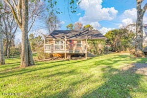 8836 Nubbin Ridge Rd, Knoxville, TN 37923 - back of property featuring a yard and a wooden deck