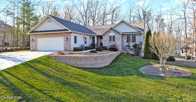 ranch-style home featuring a front lawn, driveway, roof with shingles, an attached garage, and brick siding