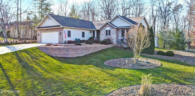 single story home featuring a front yard, a garage, and driveway