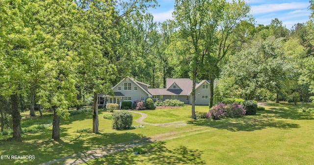1025 Lowe Rd, Cohutta, GA 30710 - view of front facade with a front lawn and a wooded view