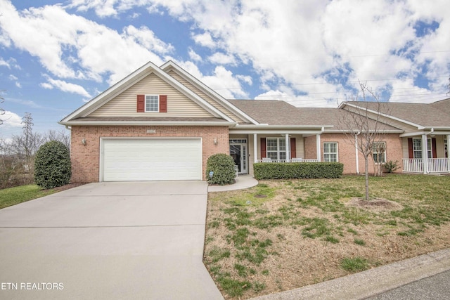 ranch-style house featuring a front lawn, driveway, covered porch, an attached garage, and brick siding