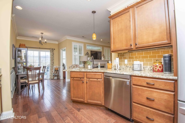 kitchen with backsplash, dark wood-type flooring, a chandelier, dishwasher, and a peninsula