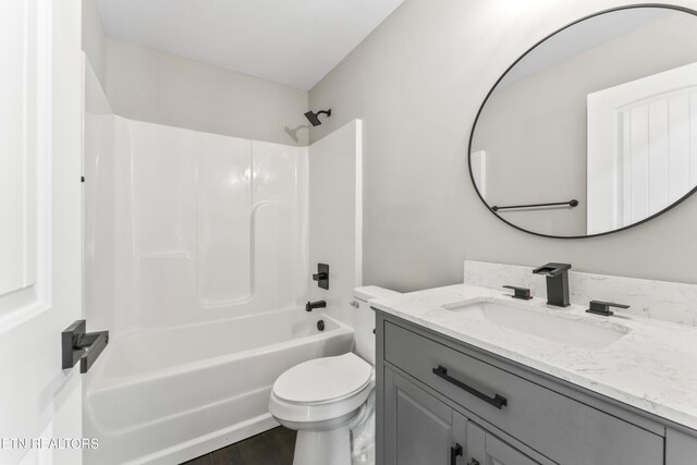 full bathroom featuring vanity, shower / bathing tub combination, and toilet
