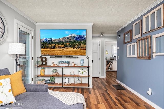 bedroom with visible vents, a textured ceiling, ornamental molding, and dark wood-style flooring