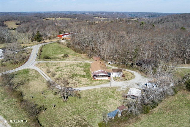 birds eye view of property with a rural view