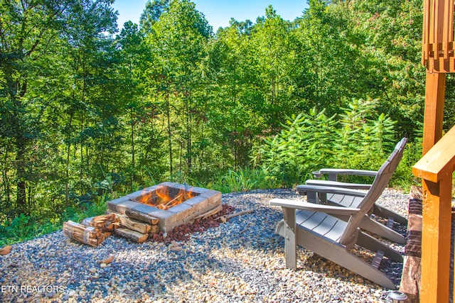 view of patio / terrace with a fire pit