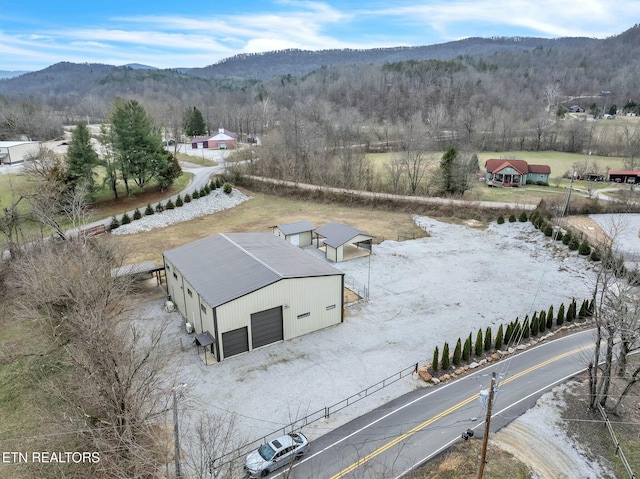 bird's eye view featuring a rural view and a mountain view