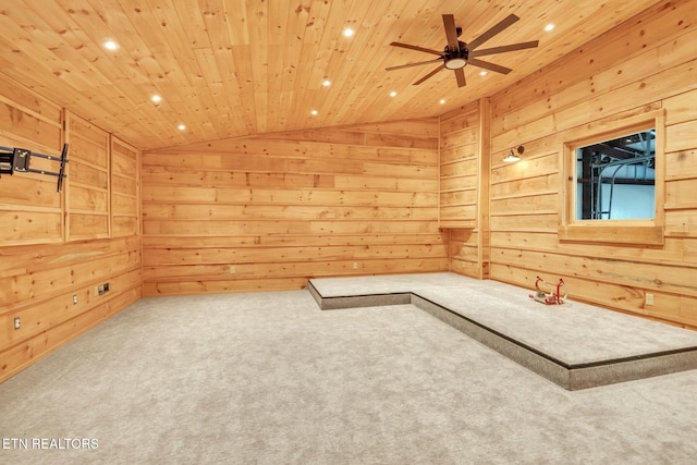 carpeted spare room with a sauna, lofted ceiling, recessed lighting, wood walls, and wooden ceiling