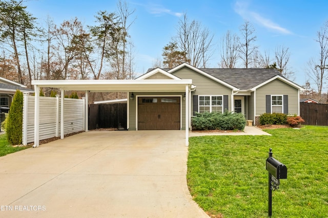 ranch-style house featuring a front lawn, concrete driveway, an attached garage, and fence