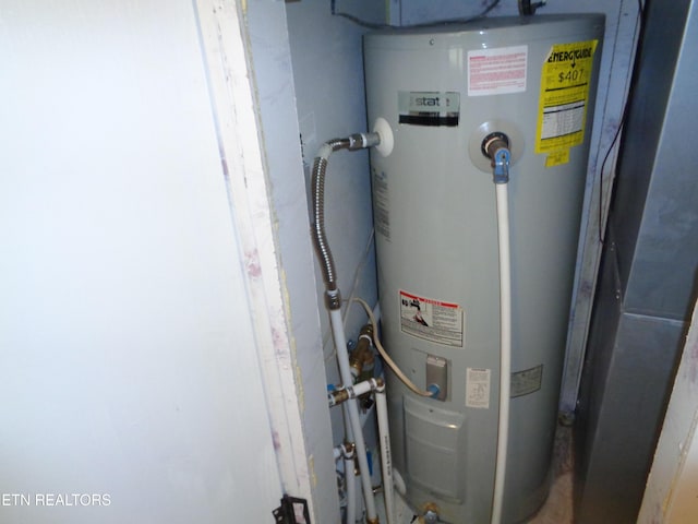 utility room with water heater