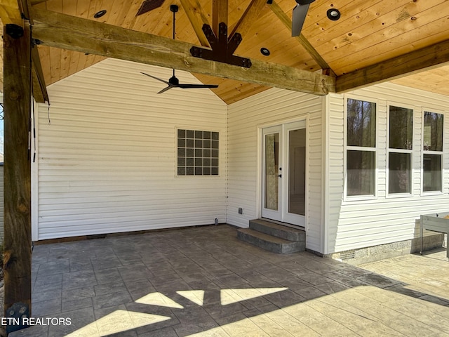 view of patio with entry steps, french doors, and ceiling fan